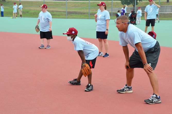 SID/Head Baseball Coach Perry volunteers time to help the "Miracle League of Frisco"