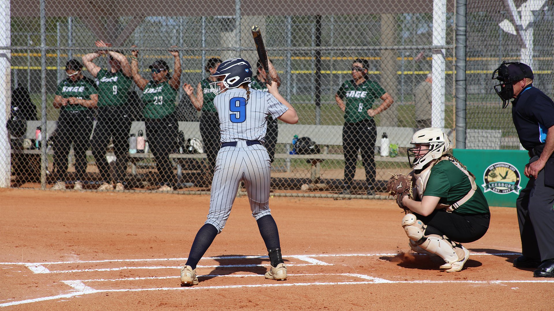 Softball Splits with Buccaneers, Caetano Launches Grand Slam in Game One