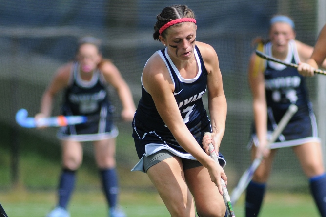 Field Hockey falls on the road at Johnson and Wales