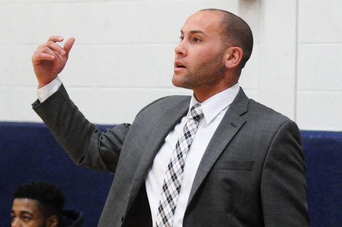 It's official! Bisson promoted to Head Men's Basketball Coach