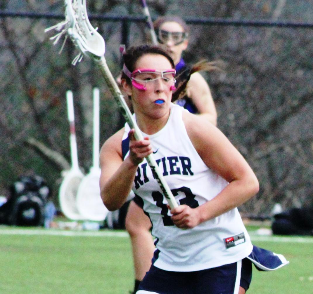 Lions trip up Raiders in WLax Home Opener