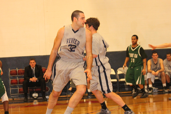 Raiders Carry Big First Half to 85-77 Win; Poitras Scores 1000